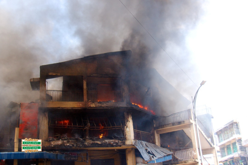 Photos: Fire destroys shops at Makola market