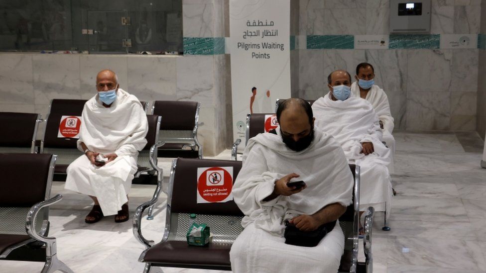 In pictures: Masks and social distancing at downsized Hajj
