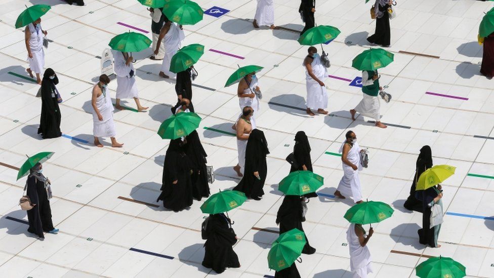 In pictures: Masks and social distancing at downsized Hajj