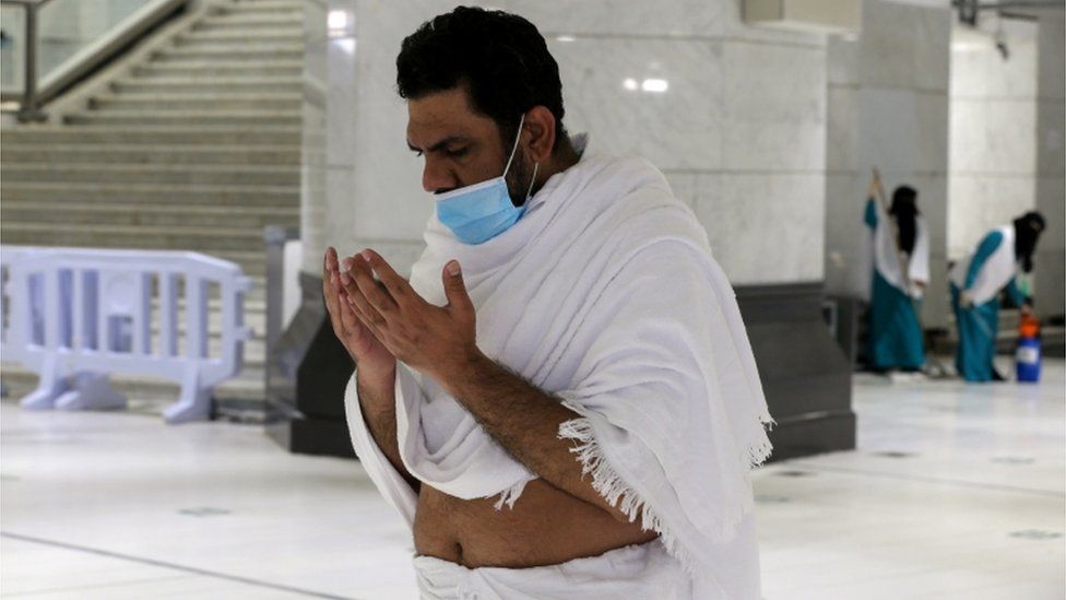 In pictures: Masks and social distancing at downsized Hajj