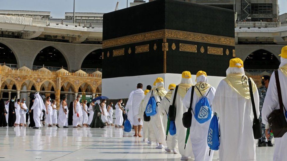 In pictures: Masks and social distancing at downsized Hajj