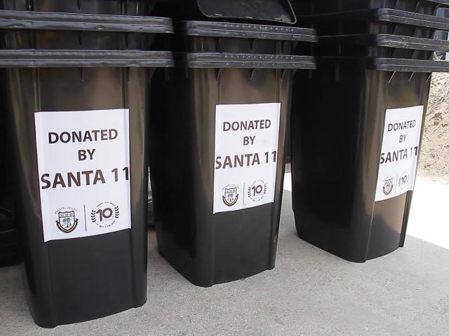 2011 group of Adisadel College donates dustbins, other items to alma mater
