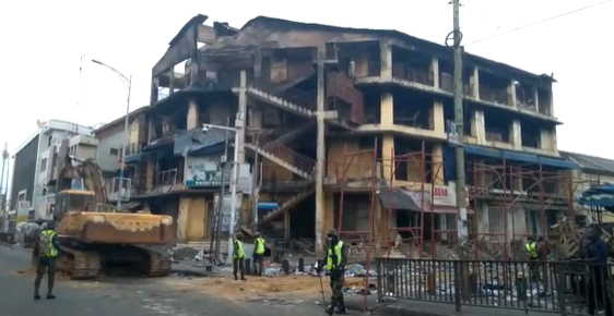 Military set to demolish 3-storey building gutted by fire at Makola