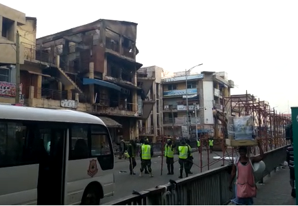 Military set to demolish 3-storey building gutted by fire at Makola