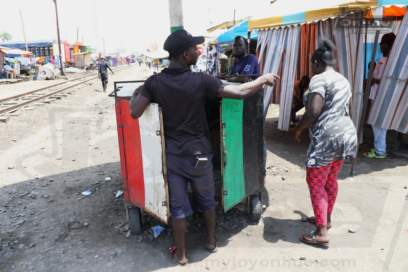 Photos : Ex-convict finds shelter in NDC giant umbrella