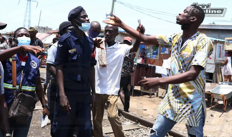 Photo of the week: Squatter threatens to beat public officer