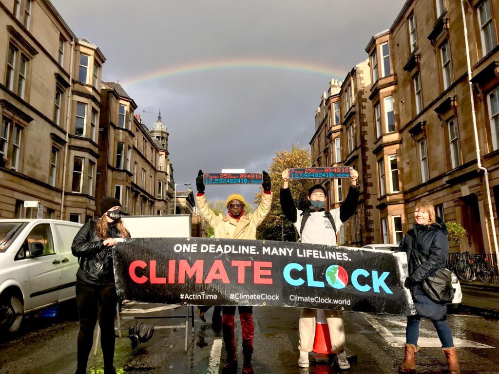 Okyeame Kwame, climate activists march in Glasgow for climate justice