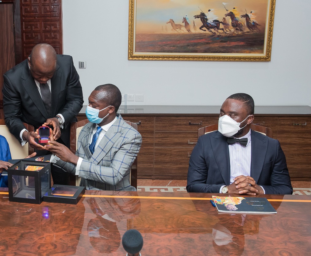 Akufo-Addo receives Otumfuo Commemorative Gold Coin Akufo-Addo receives Otumfuo Commemorative Gold Coin
