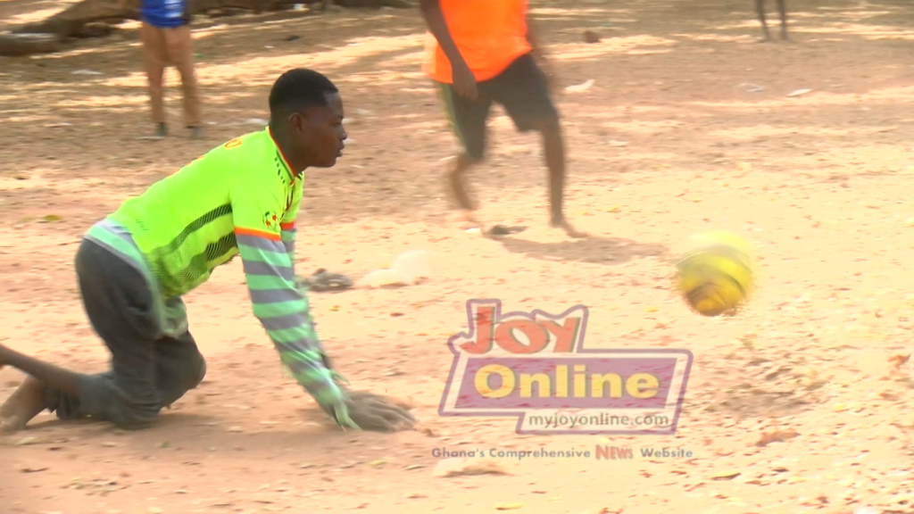 Down but not out - Inspirational story of a 16-year-old physically-challenged aspiring to be a footballer Wahab Kadir plays football with hands www.myjoyonline.com