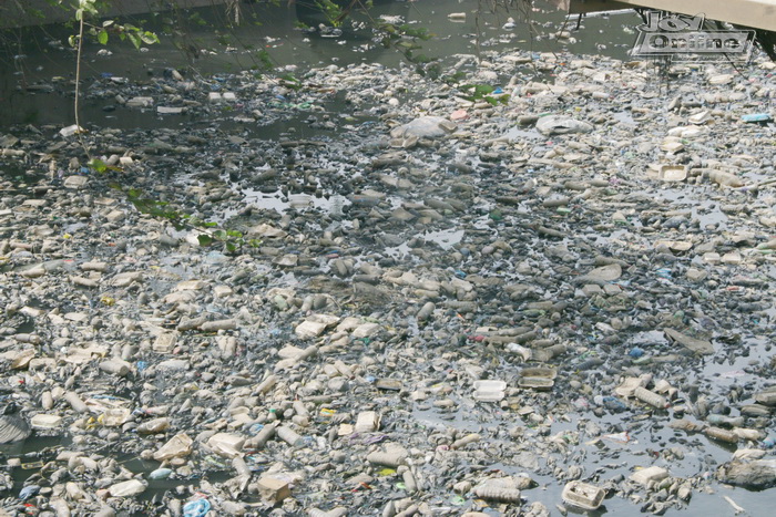 Odaw river filed with plastic waste