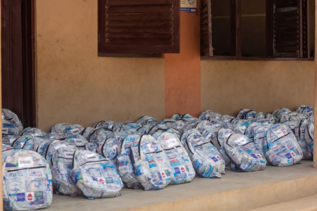 For The Future Ghana partners SchoolInABag, and Trashy Bags Africa to donate 353 filled school bags to underprivileged students