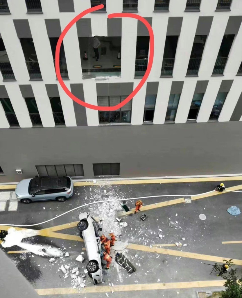 2 dead as electric car falls from third floor office in Shanghai