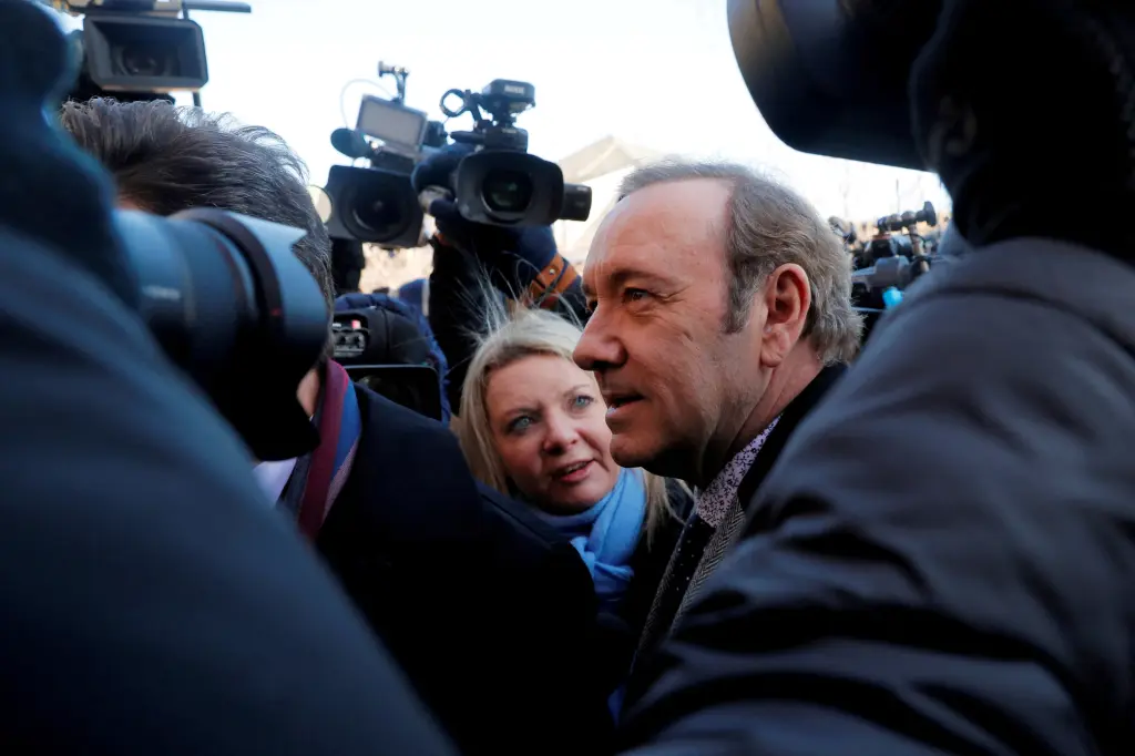 Kevin Spacey charged with four sexual assaults ahead of London court appearance