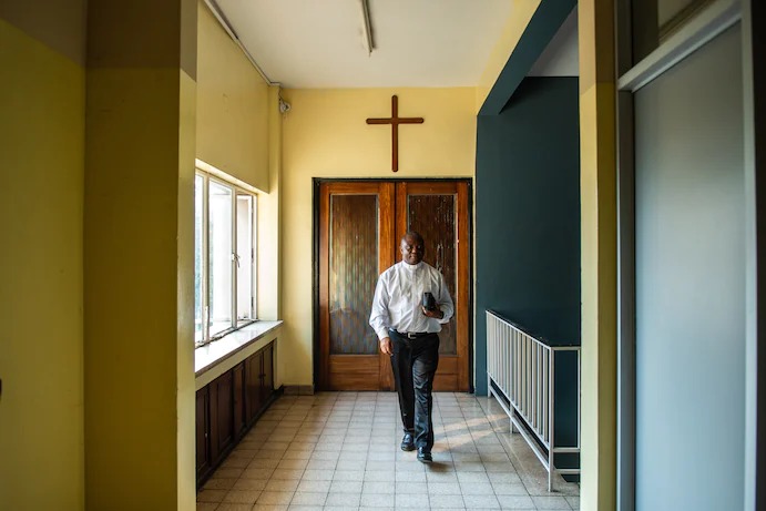 A Congo teen alleged rape by a priest. She had to flee. He can still say Mass.
