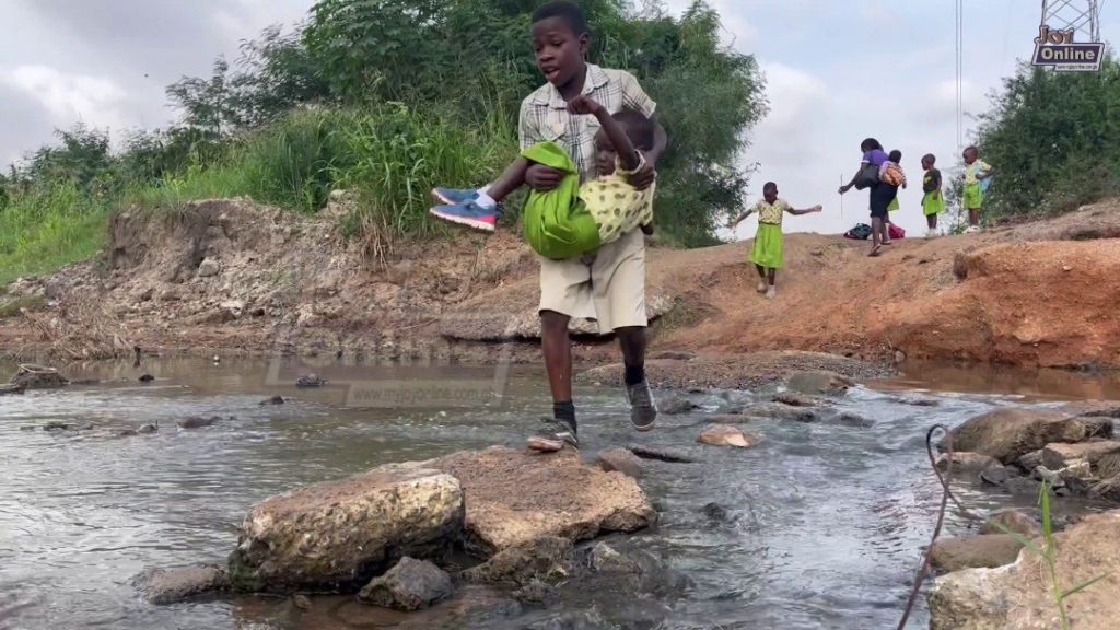 Pupils in Borteyman risk their lives through stream to access education