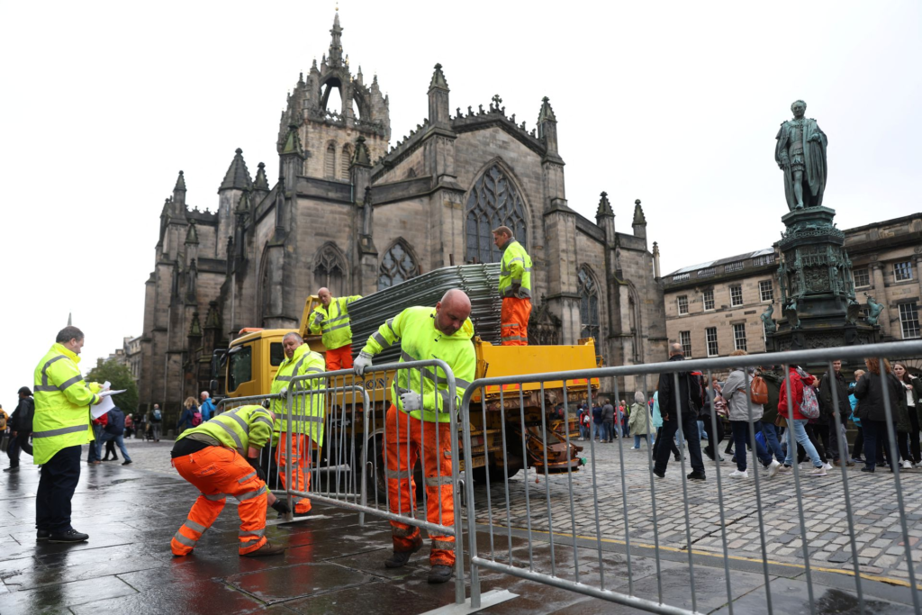 Queen Elizabeth II's coffin arrives in Edinburgh, mourners line streets to pay their respects