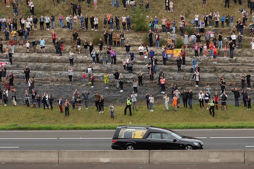 Queen Elizabeth II's coffin arrives in Edinburgh, mourners line streets to pay their respects