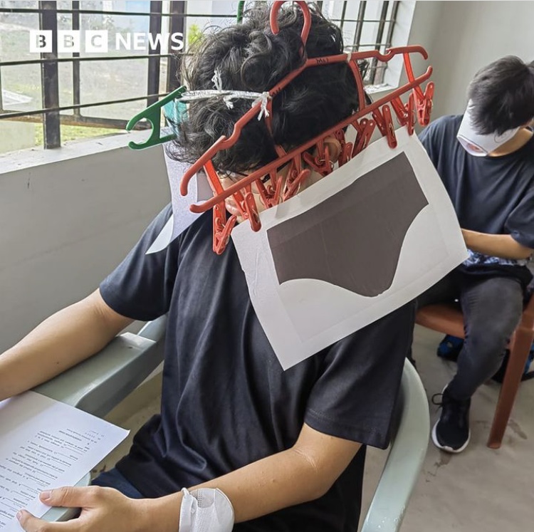 Students wearing 'anti-cheating' exam hats goes viral 