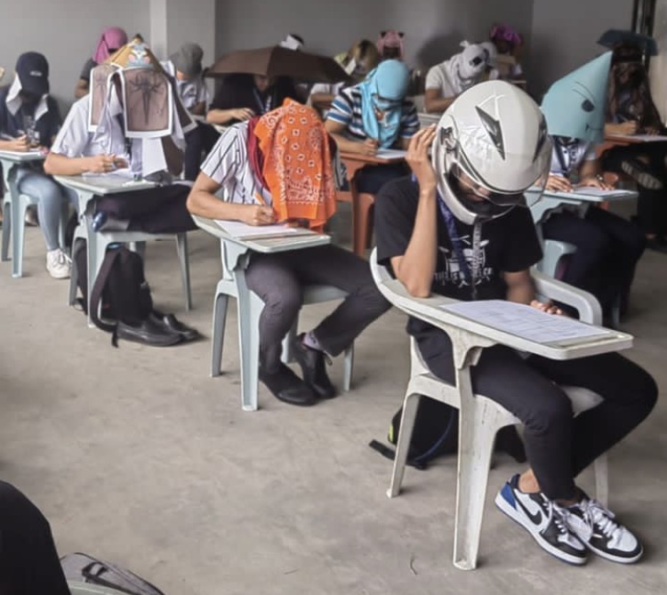 Students wearing 'anti-cheating' exam hats goes viral 