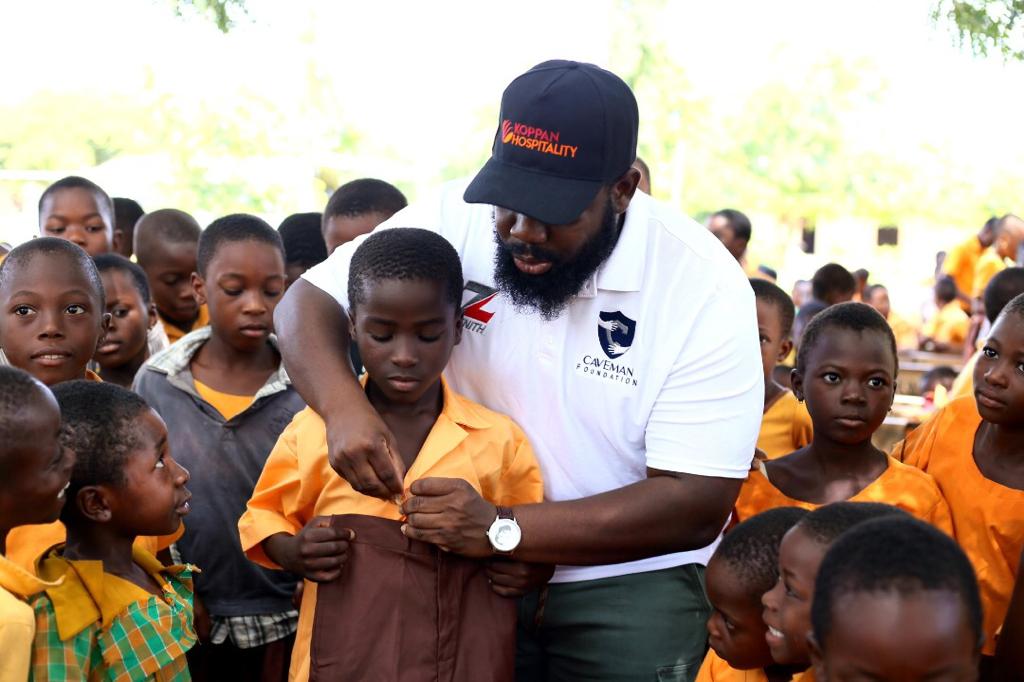 Caveman Foundation presents uniforms, shoes and other self-care items to students in Ketu North
