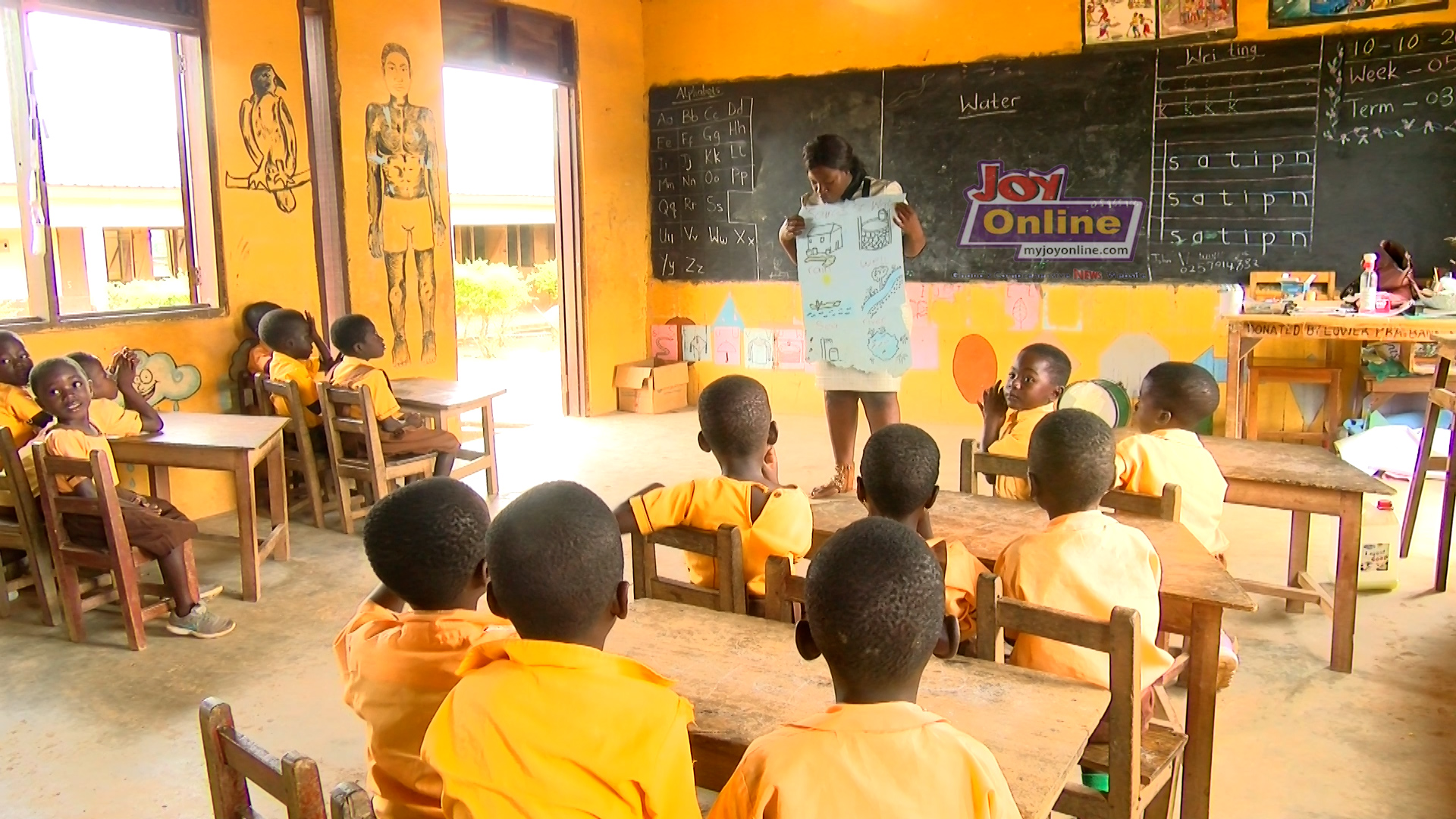 Pupils of local Atwereboanda Primary learning about water sources