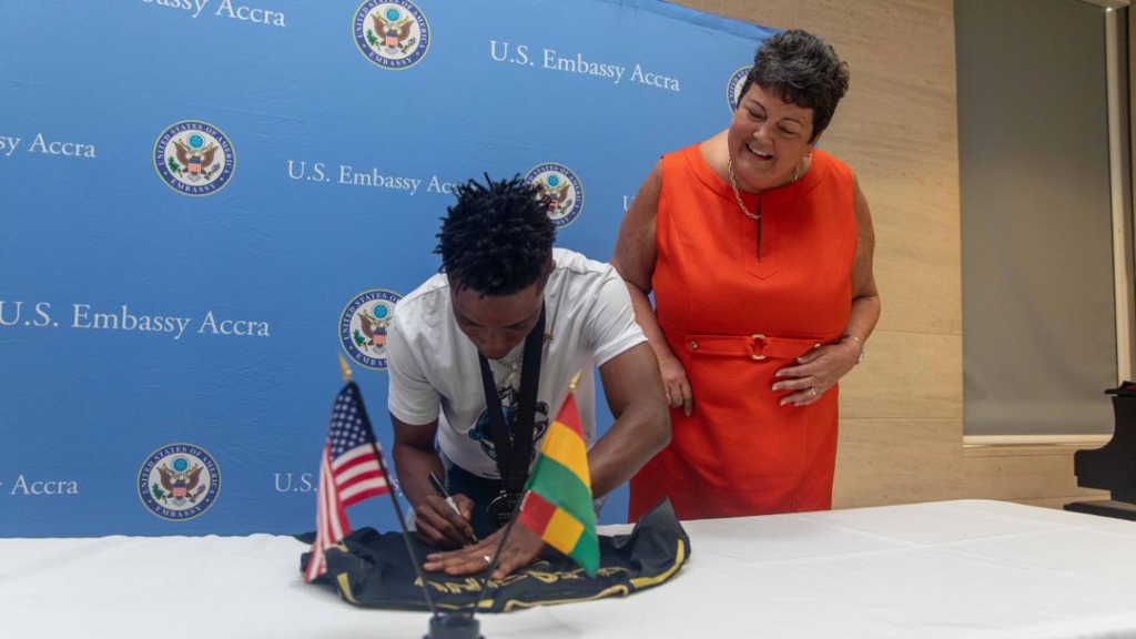 2022 MLS Cup winner Latif Blessing presents medals to US Ambassador