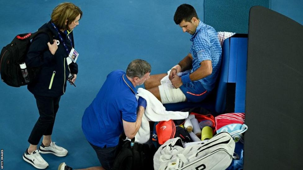 Australian Open: Novak Djokovic overcomes injury in win on day six