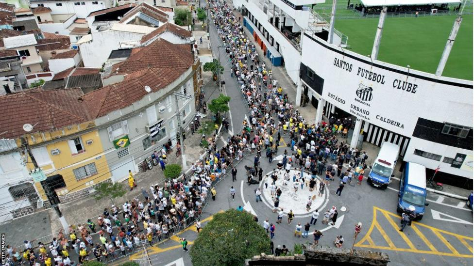 Thousands line streets of Santos as Brazil Pele is laid to rest