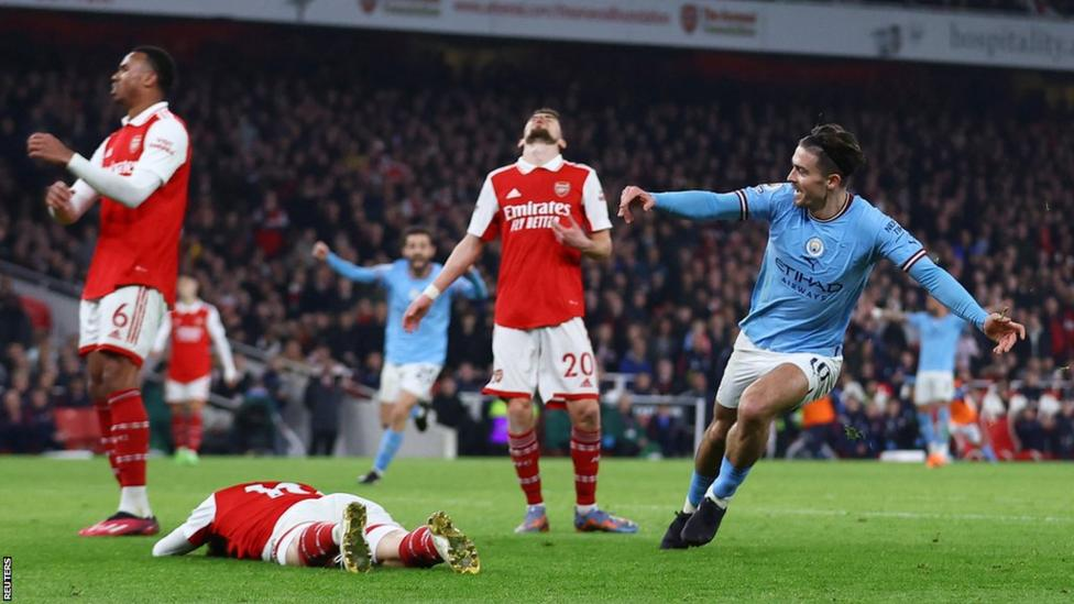 Man City go top with win over title rivals Arsenal