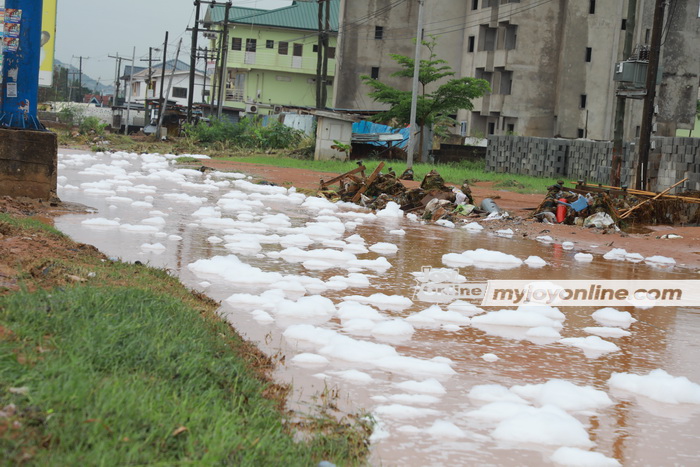 Waste water flowing on Accra-Kasoa highway turns foamy