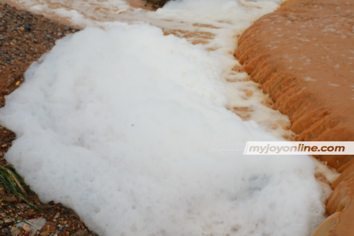 Waste water flowing on Accra-Kasoa highway turns foamy