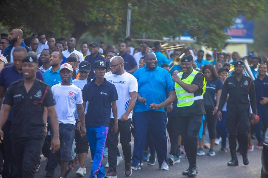 Hundreds join OmniBSIC Bank maiden health walk