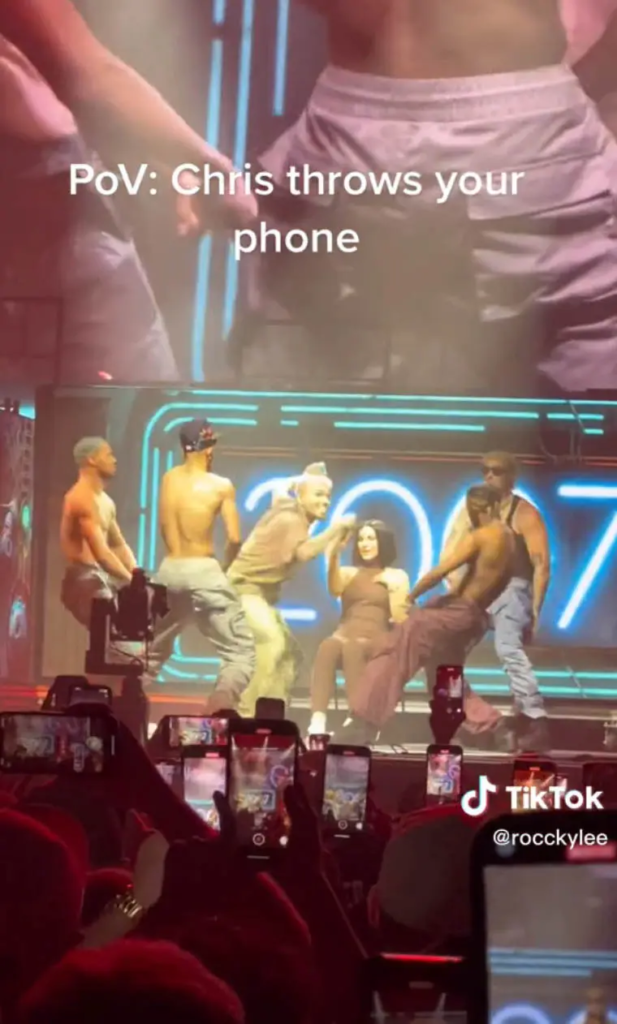 Chris Brown throws fan’s phone into the crowd for filming while on stage