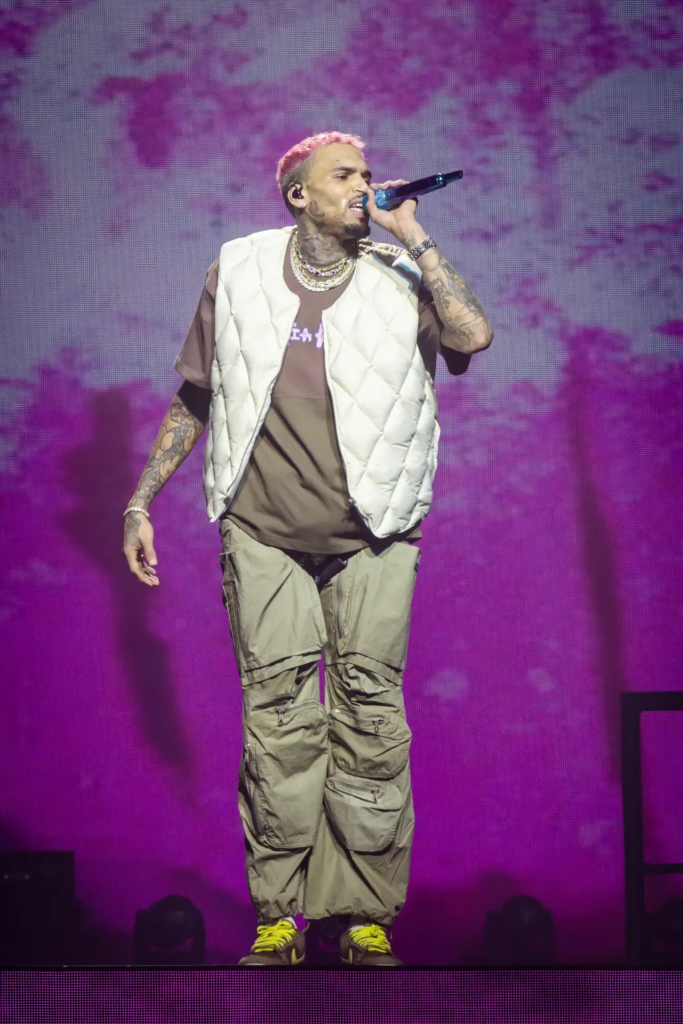 Chris Brown throws fan’s phone into the crowd for filming while on stage