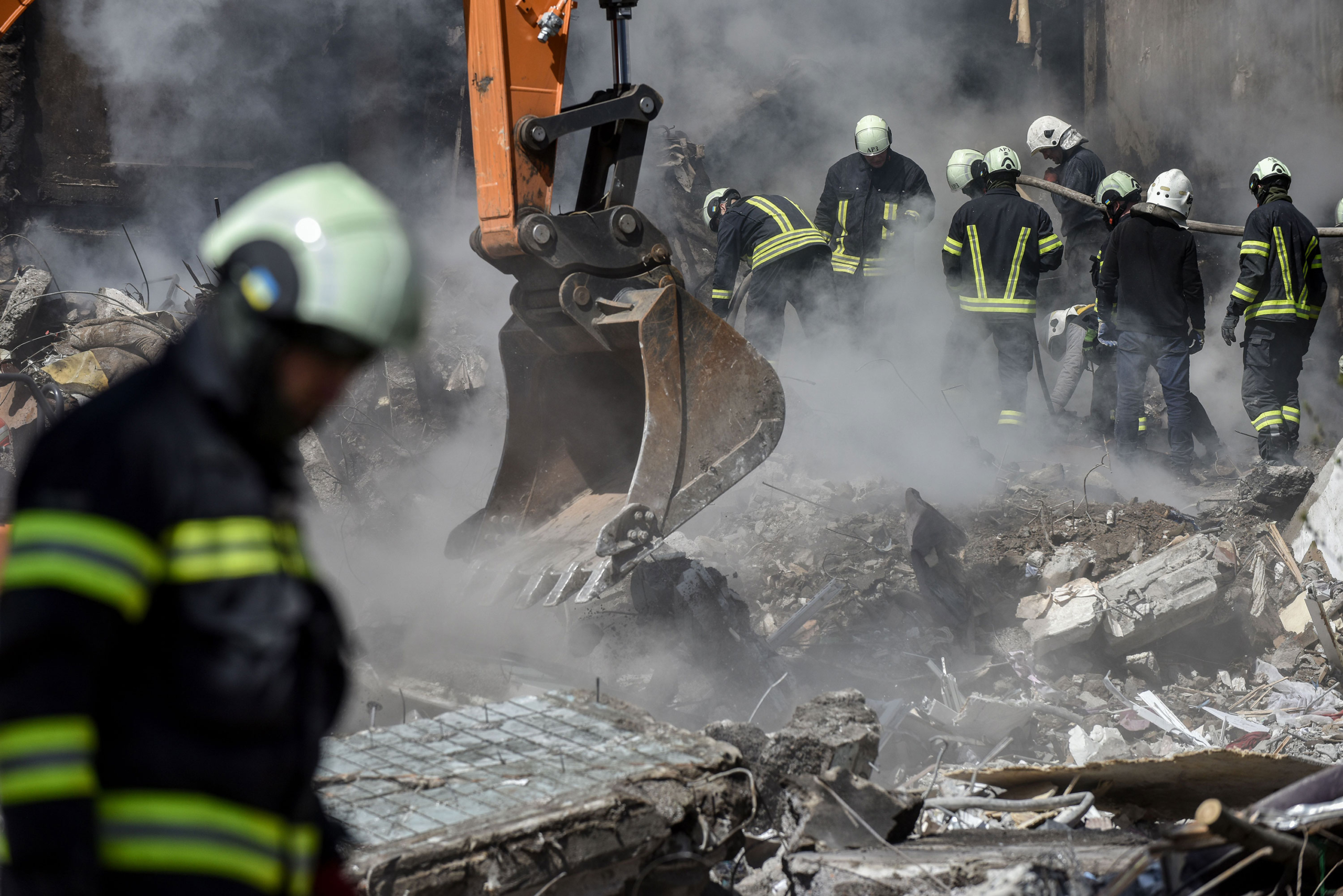 Rescuers work at the site of a damaged residential building in Uman, Ukraine, on Friday. (Oleg Petrasyuk/EPA-EFE/Shutterstock)