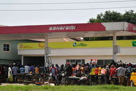 Long queues have formed at petrol stations with prices skyrocketing