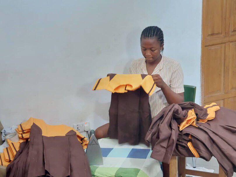 Meet Janet Asibi, a teacher who provides free uniform sewing services for students in need