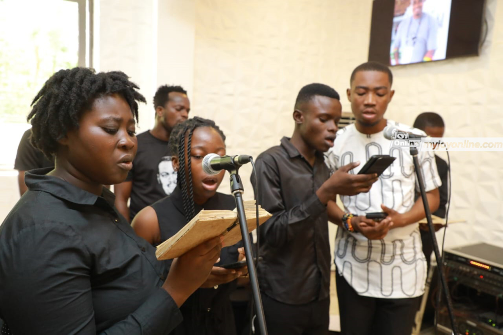 Photos from burial service of The Multimedia Group's Lead Camera Technician, Modestus Zame