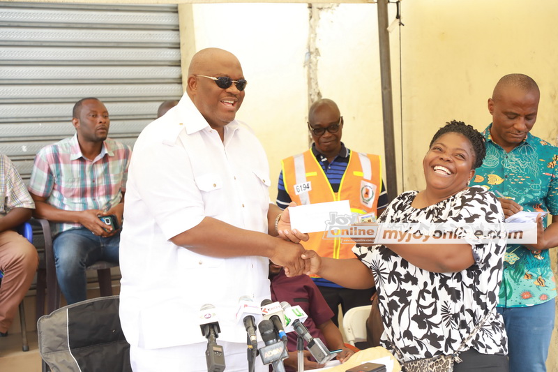 Greater Accra Regional Minister supports fire victims at Circle - Vimarsana News