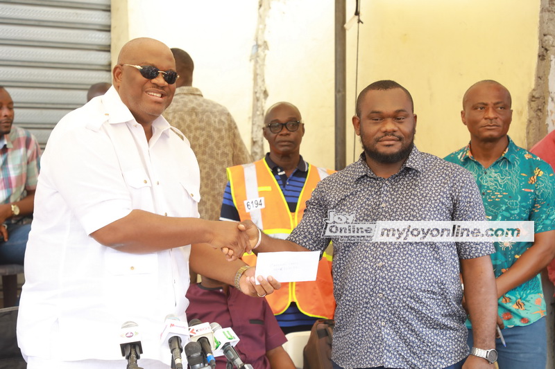 Greater Accra Regional Minster supports fire victims at Circle