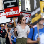 Writers sign off on new deal officially ending one of Hollywood’s longest strikes