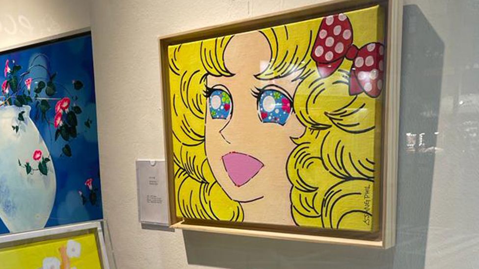 A painting of the anime character Candy Candy hangs in a Seoul art gallery