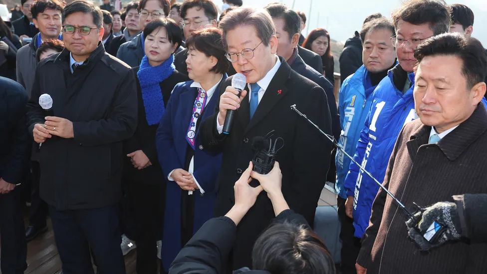 South Korea opposition leader stabbed in neck on visit to Busan