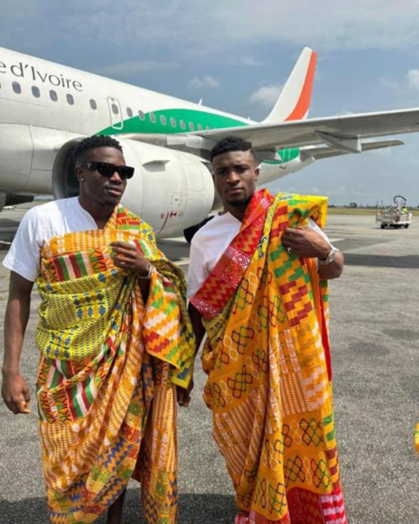 The Black Stars football team lands in Ivory Coast for the 2023 Africa Cup of Nations (AFCON), showcasing cultural pride in traditional kente attire