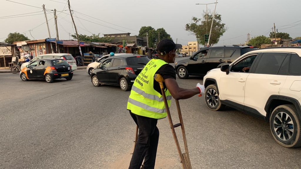 Physically challenged man directs traffic for 11 years when lights fail to shine