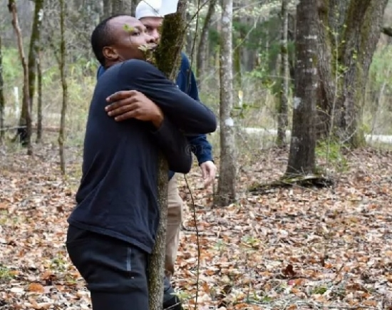 Ghanaian activist hugs over 1,100 trees in an hour to set Guinness World Records