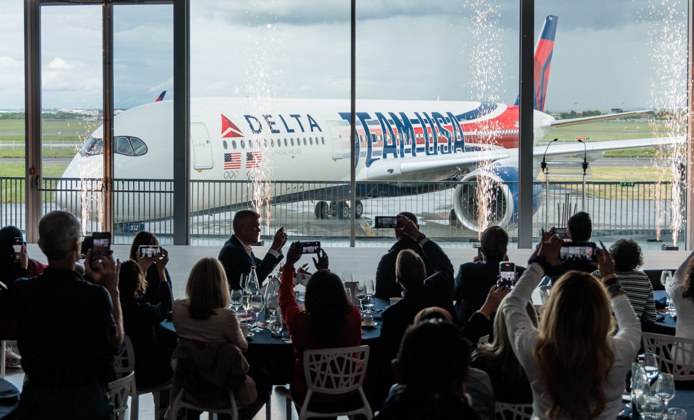 Employee honorees celebrate the reveal of new Team USA aircraft in France - Vimarsana News