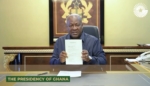 President John Mahama displaying the GoldBod Act immediately after assenting to it
