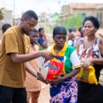 Philanthropist Dr Ansah supports flood victims in Ashaley Botwe through Van Calebs Walking Stick Foundation