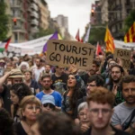 Demonstrators march shouting slogans against the Formula 1 Barcelona Fan Festival in downtown Barcelona, Spain, Wednesday, June 19,2024, during residents protest against mass tourism. (AP Photo/Emilio Morenatti, File)